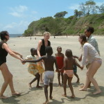 Children and some visiting English Medical Students on Pangani Beach